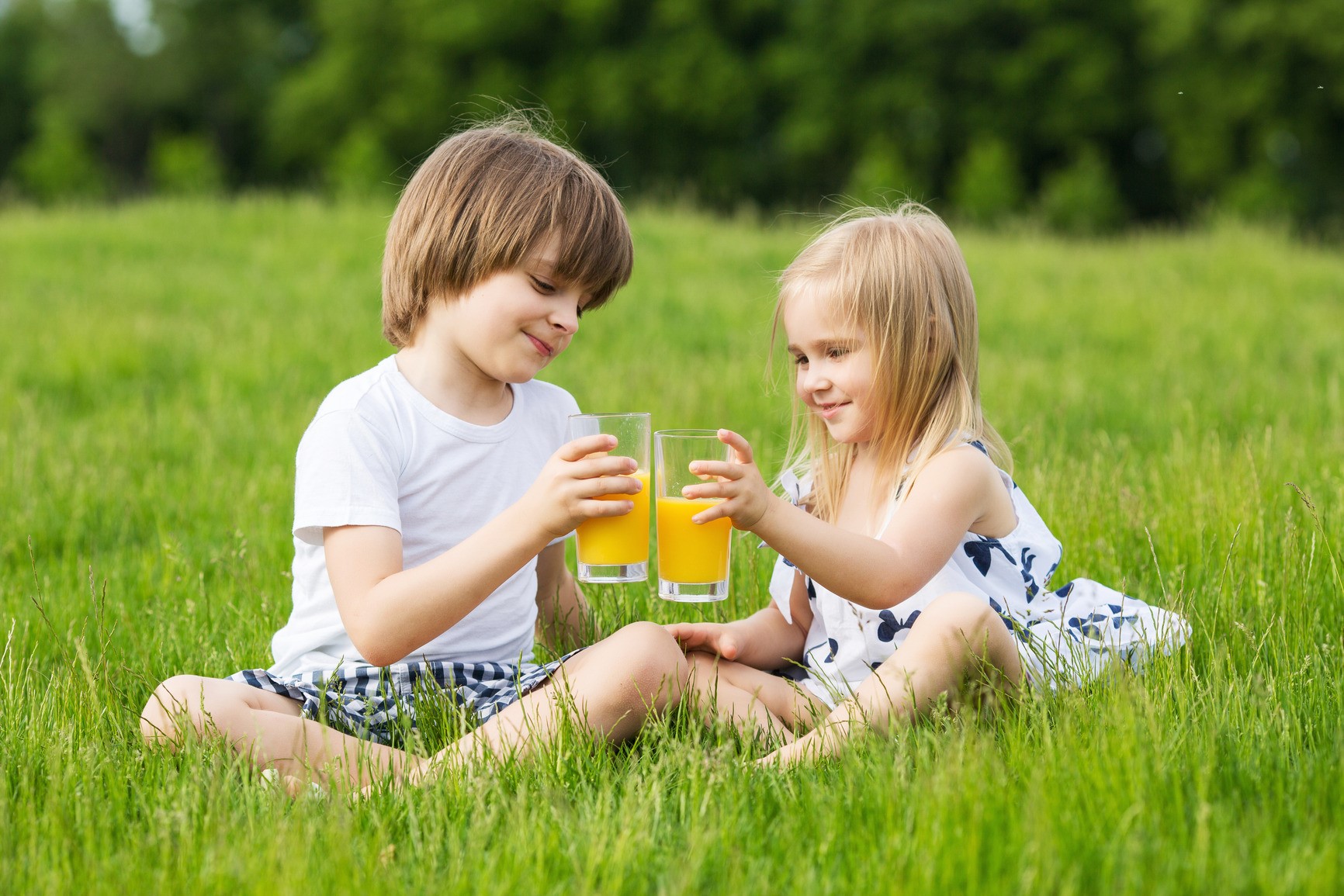 Kids drinking juice