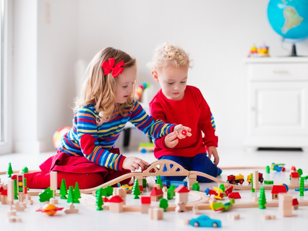 children-playing-with-toy-rail-108123167